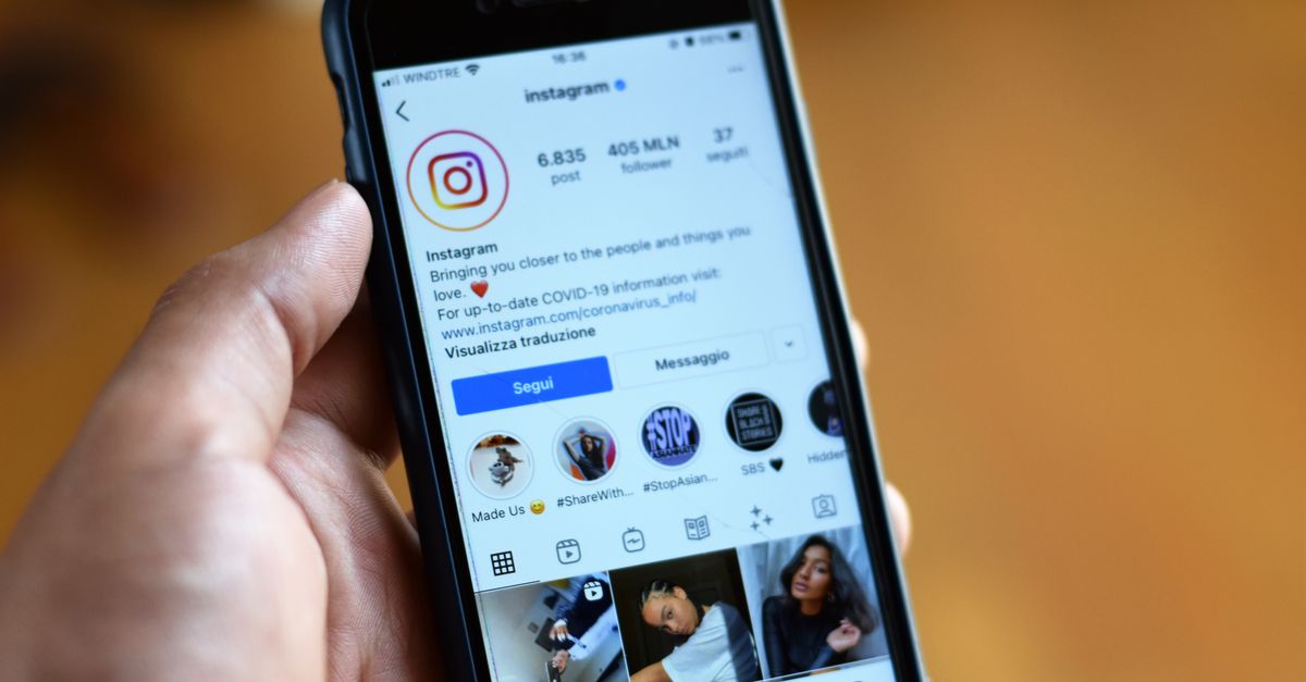 Close-up of a smartphone displaying an Instagram profile screen.