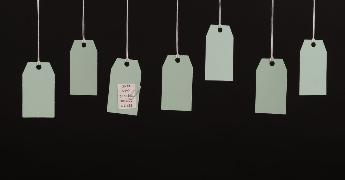 Aesthetic minimalist hanging tags on black background for branding.